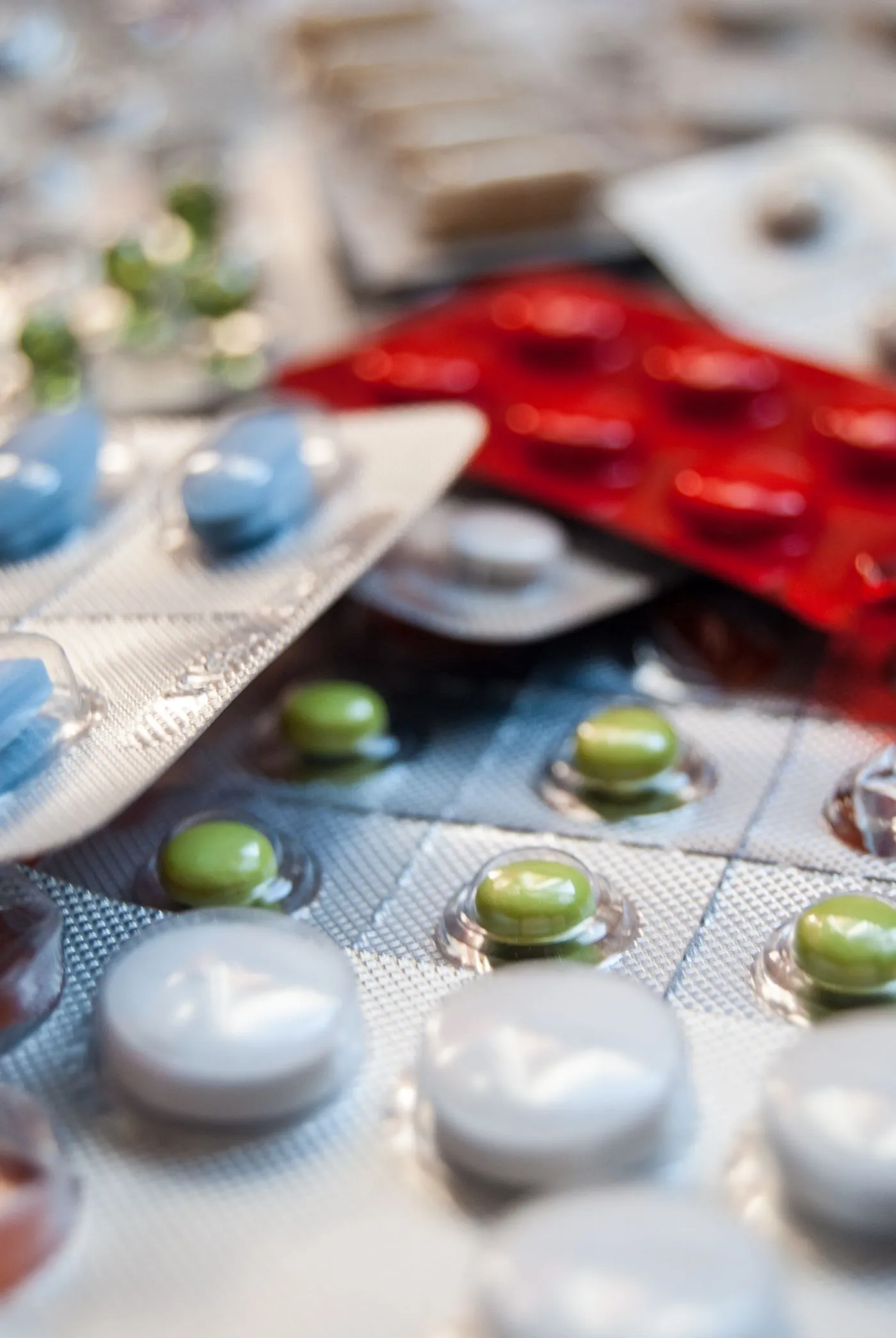 Close-up of prescription tablets sealed in blister packs.
